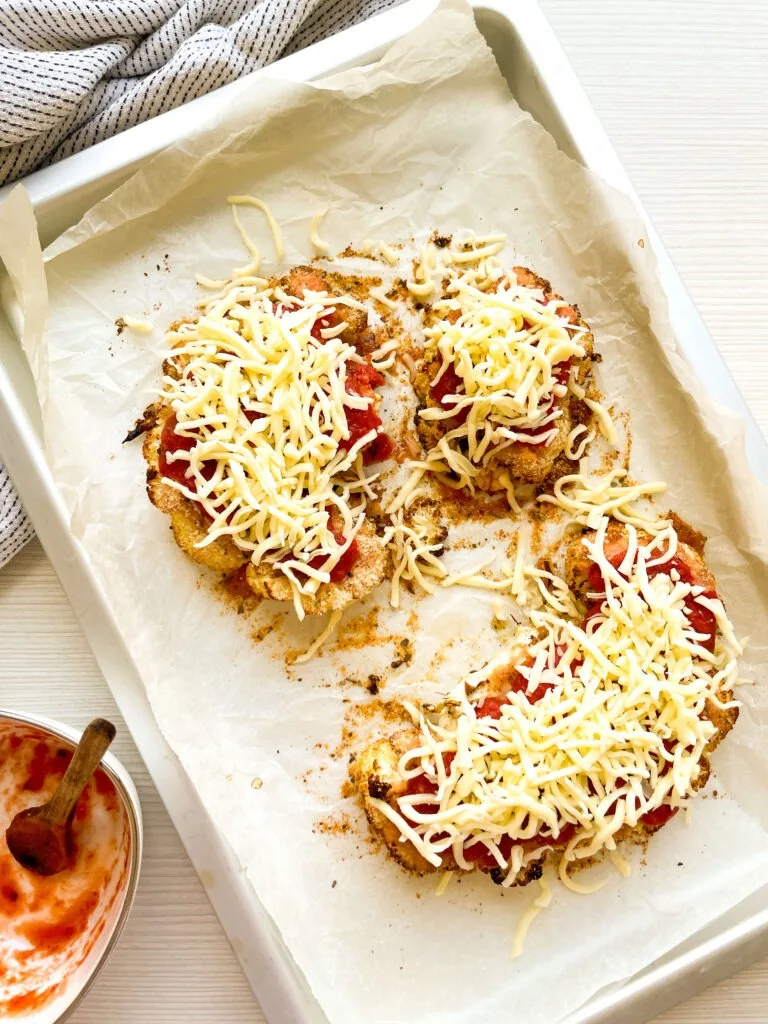 Baked Cauliflower with cheeze and tomatoes