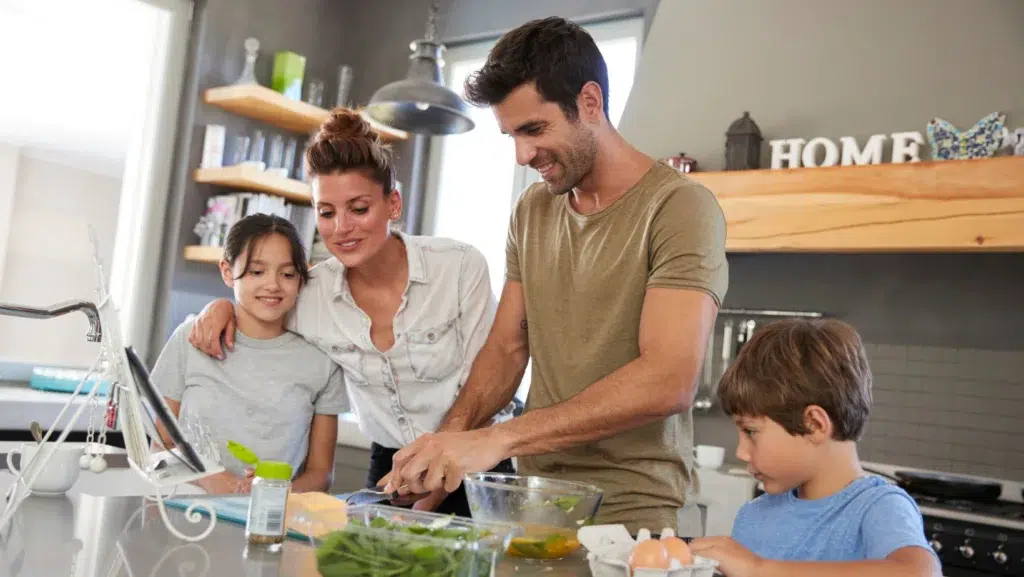 Family Preparing Meal Together What Makes an Ideal Kitchen? Key Factors to Consider