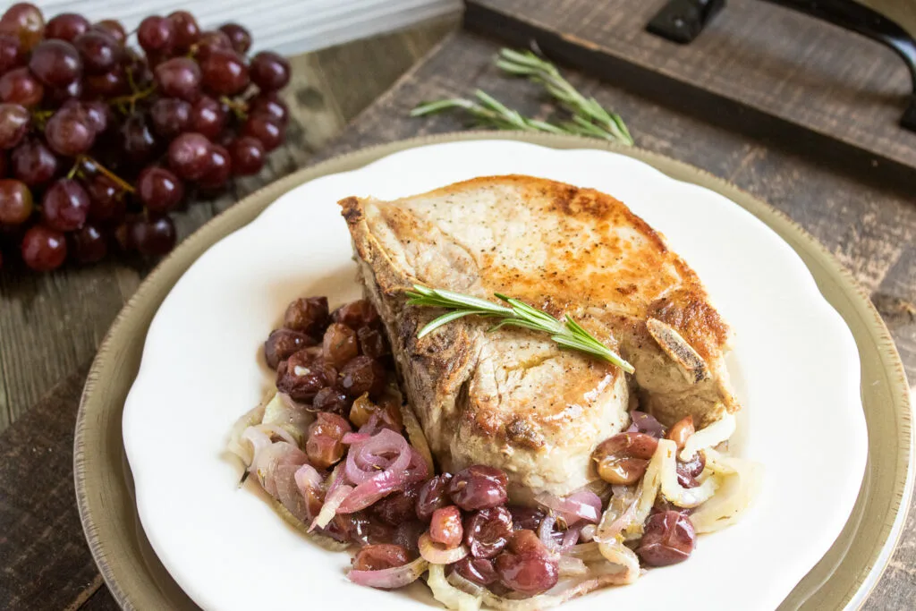 Elevate Your Dinner: Thick-Cut Pork Chops with Roasted Grapes & Fennel
