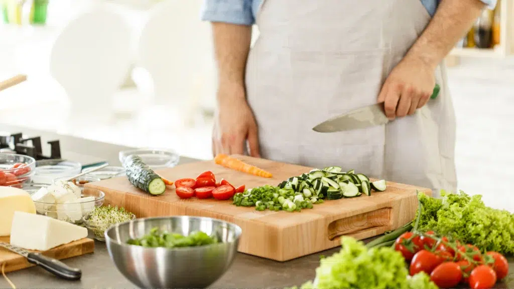 Chef cutting vegetables, making salad - No-Heat Cooking