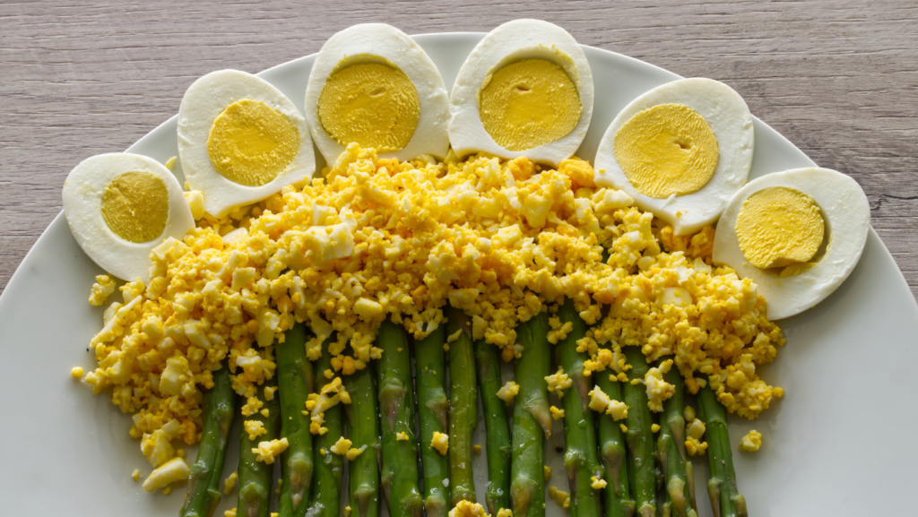 Boild green asparagus with mimosa boiled eggs