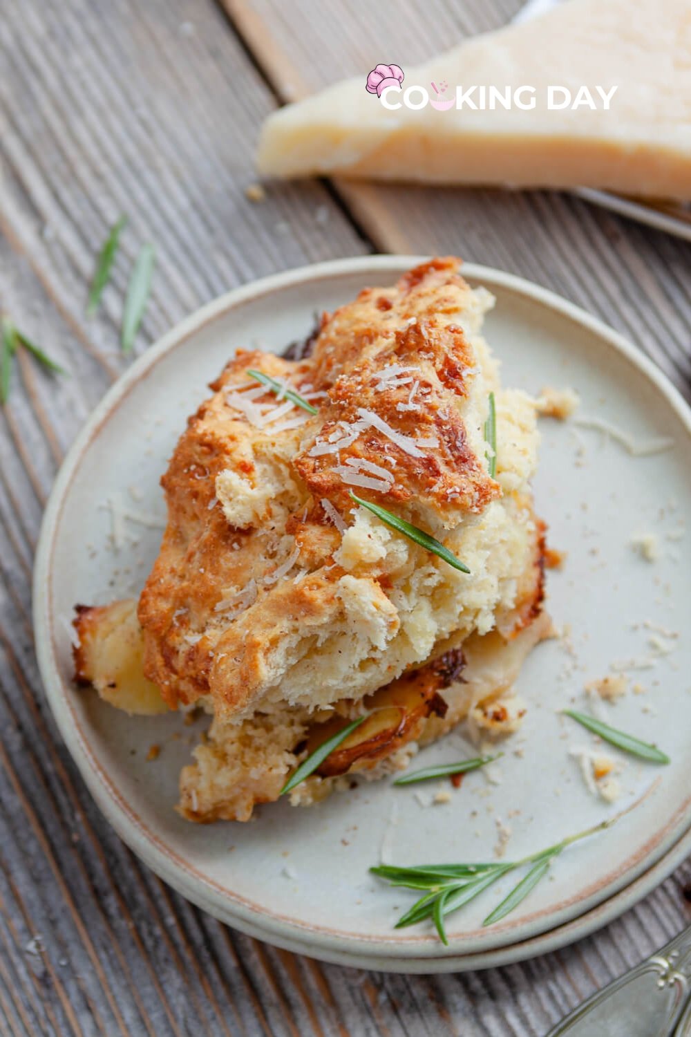 Cheesy Potato Cobbler – The Ultimate Comfort Food! -A golden-brown cheesy potato cobbler in a baking dish, with gooey melted cheese on top.