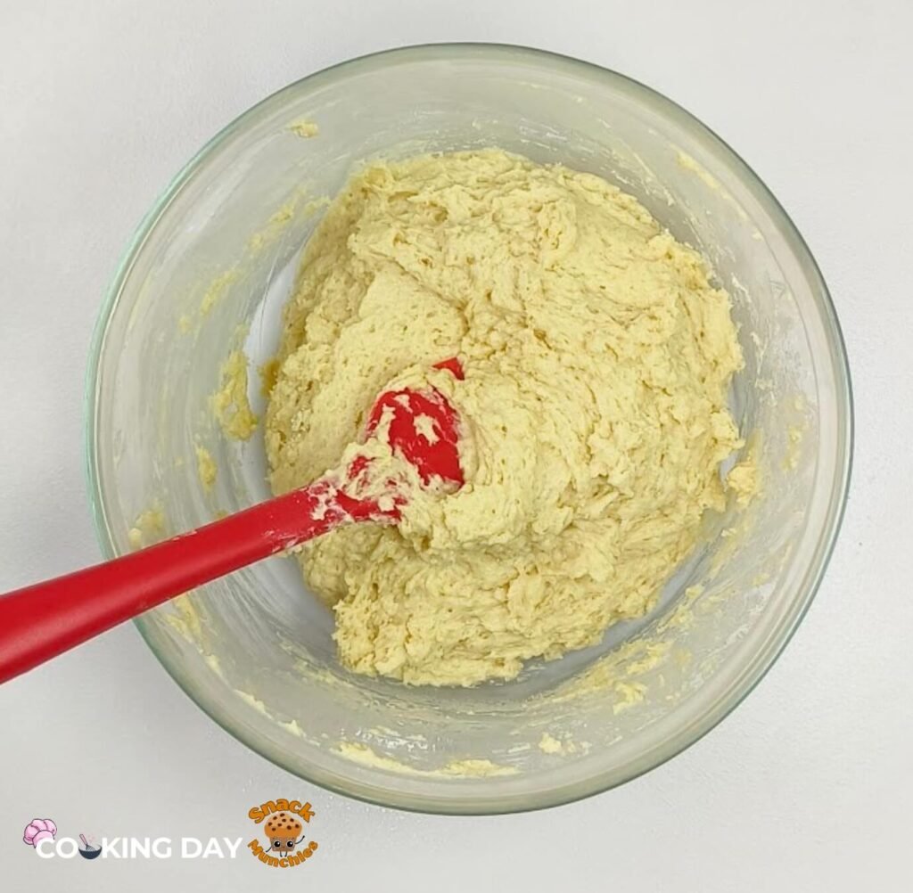 A bowl of combine dry and wet Ingredients Chocolate Chip Muffins Recipe