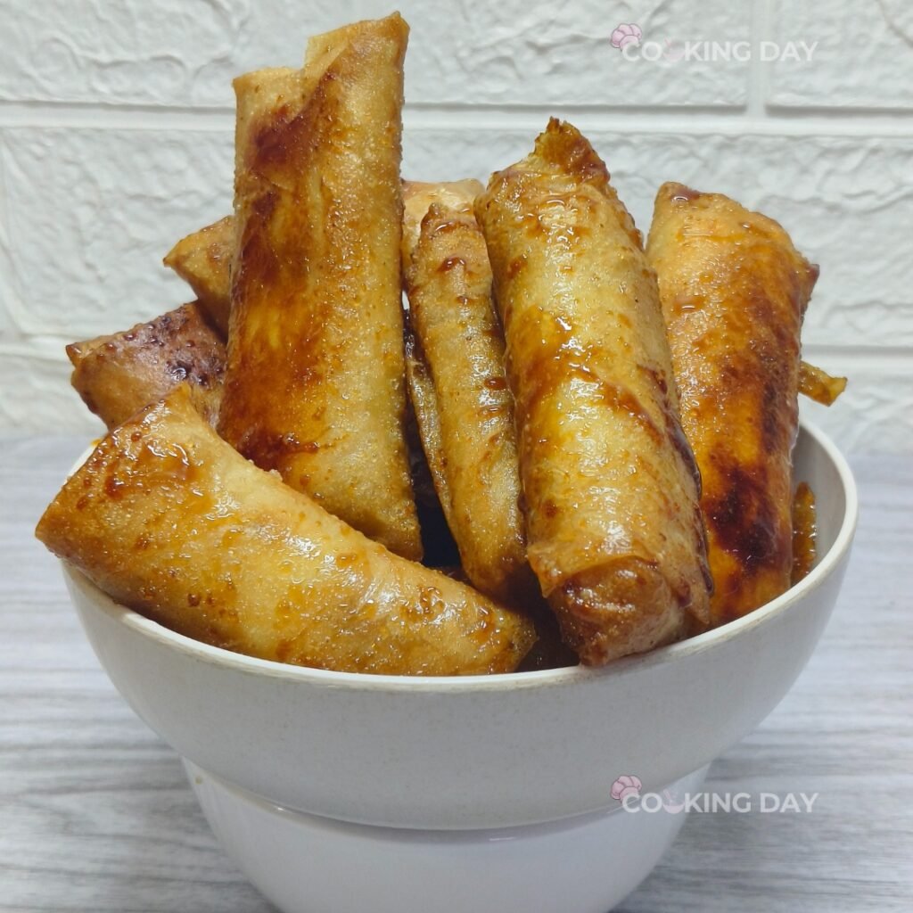 Serve the cheese turon -Cheese Turon (Cheese Banana Lumpia) – A Sweet & Savory Filipino Delight! 🧀🍌🔥