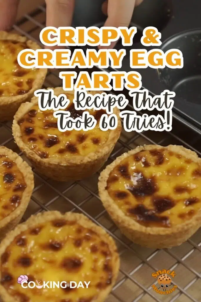 Egg tarts arranged on a plate with flaky edges and rich yellow custard.