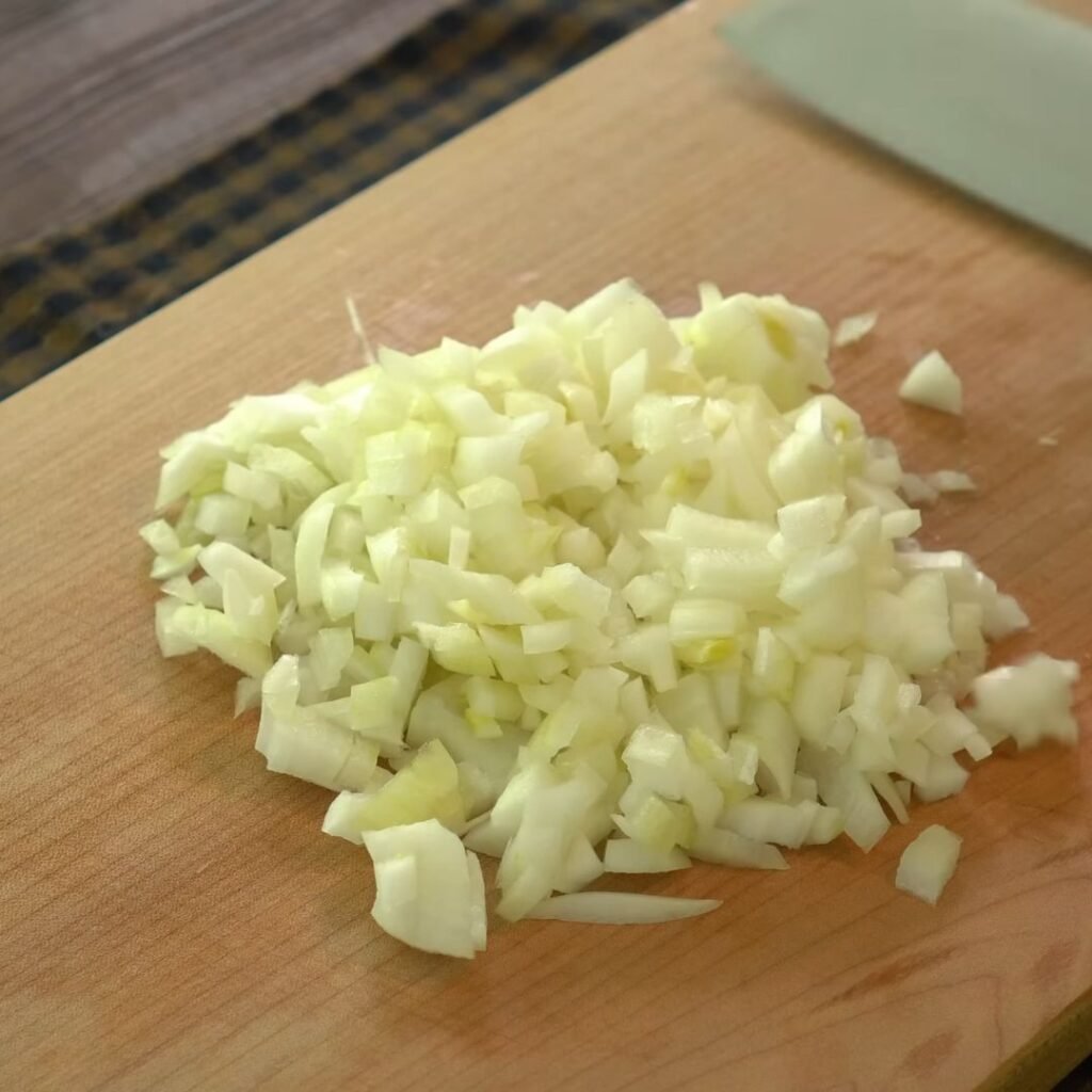 Chop the onion -Sweet Chili Chicken Potato Bake (A Flavor-Packed Dinner) 1