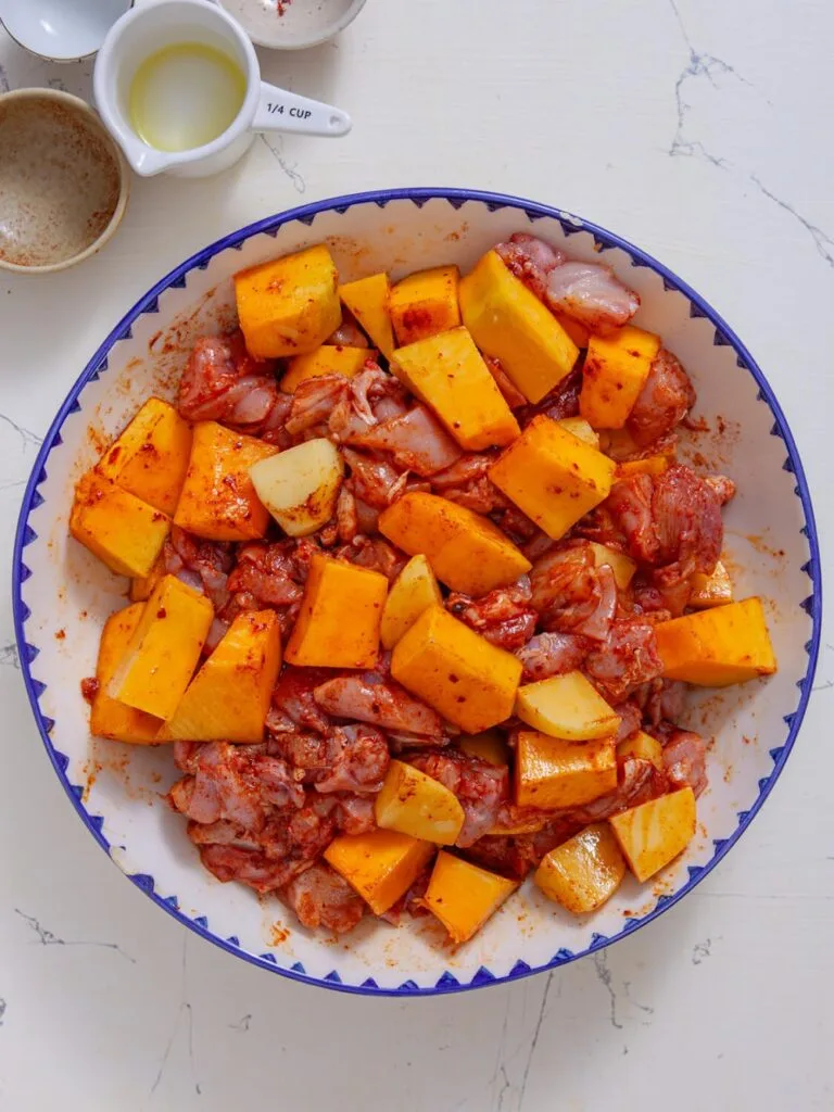 Mix and Marinate the Ingredients -Spicy Pumpkin Chicken Casserole
