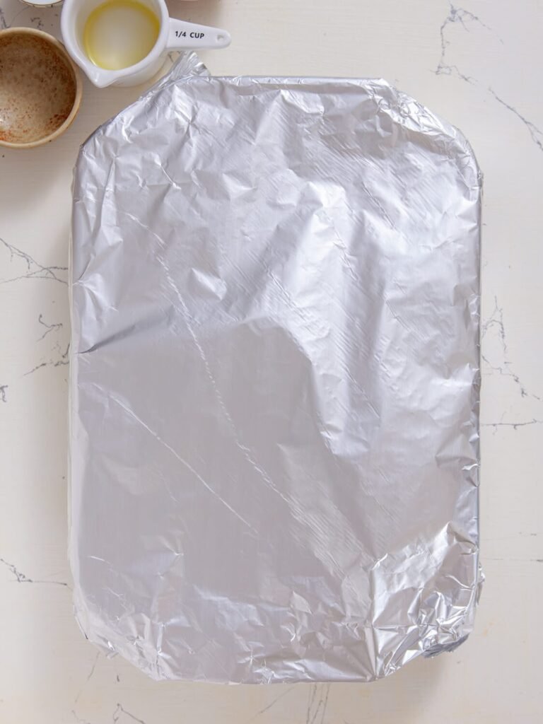 Cover with aluminum foil and Bake - Spicy Pumpkin Chicken Casserole
