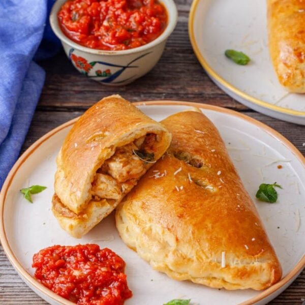 Chicken and Pesto Calzones: Handheld Pizza Pockets with a Flavor Twist